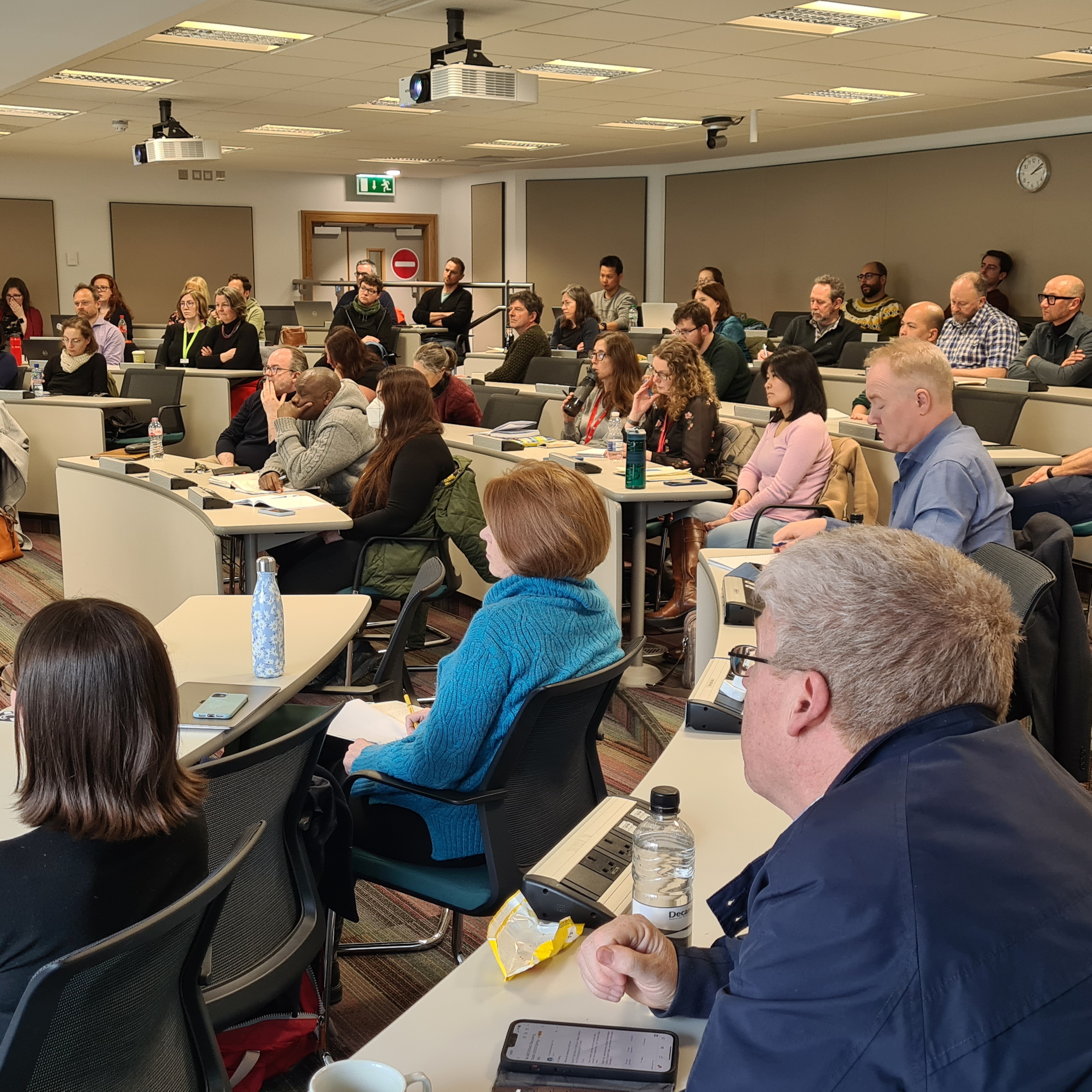 UCD Research supervisors and faculty members sitting and listening to an RSSDp presentation